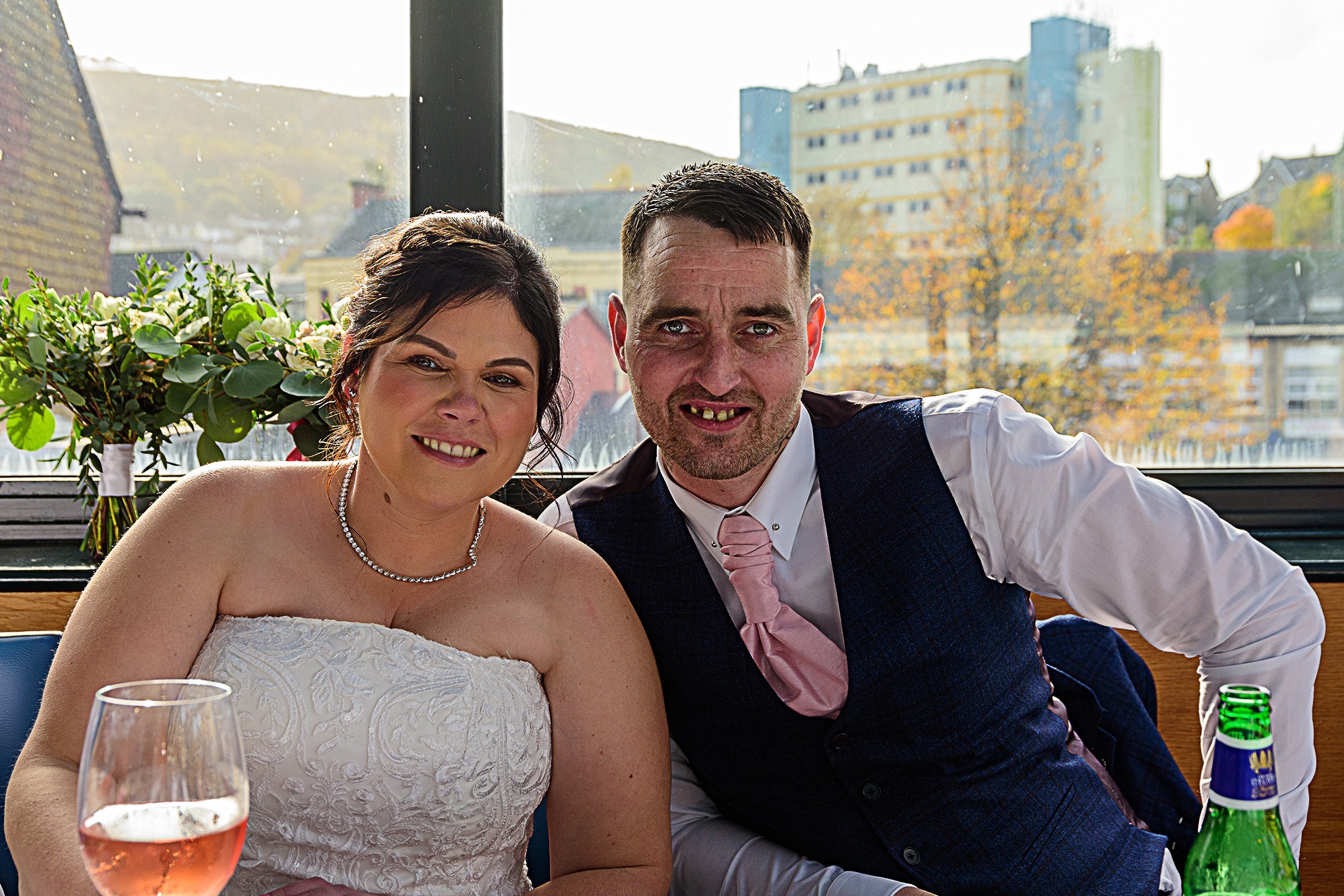 Bride and groom celebrating their wedding reception at Alfred's Bar and Grill in Pontypridd