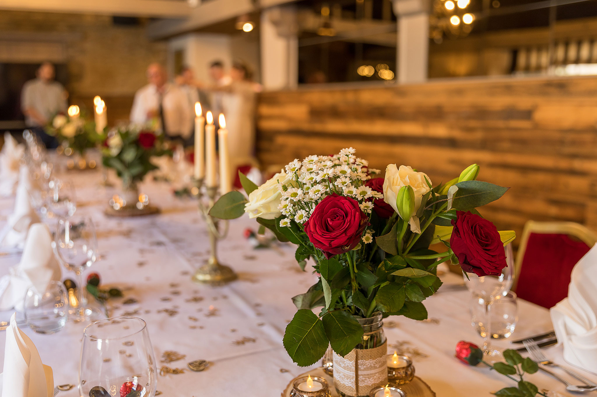 The reception awaits the bride & groom to arrive at the Bull Hotel Fairford, Gloucestershire. Relaxed wedding photography from Hannah Clegg.